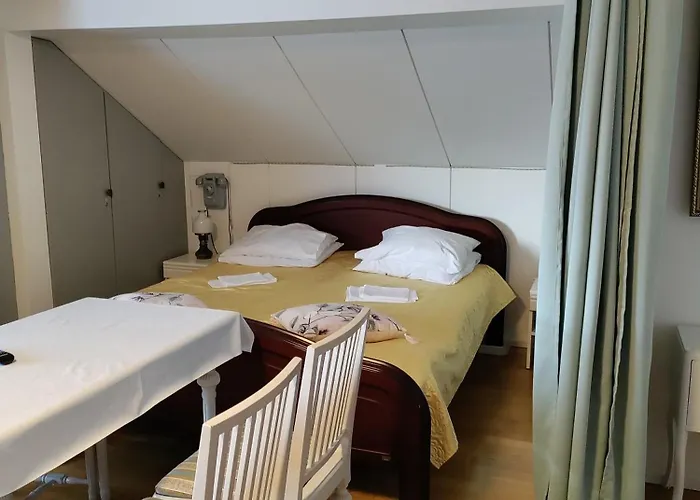 Huone 1-4 Henkiloelle Рийхимяки